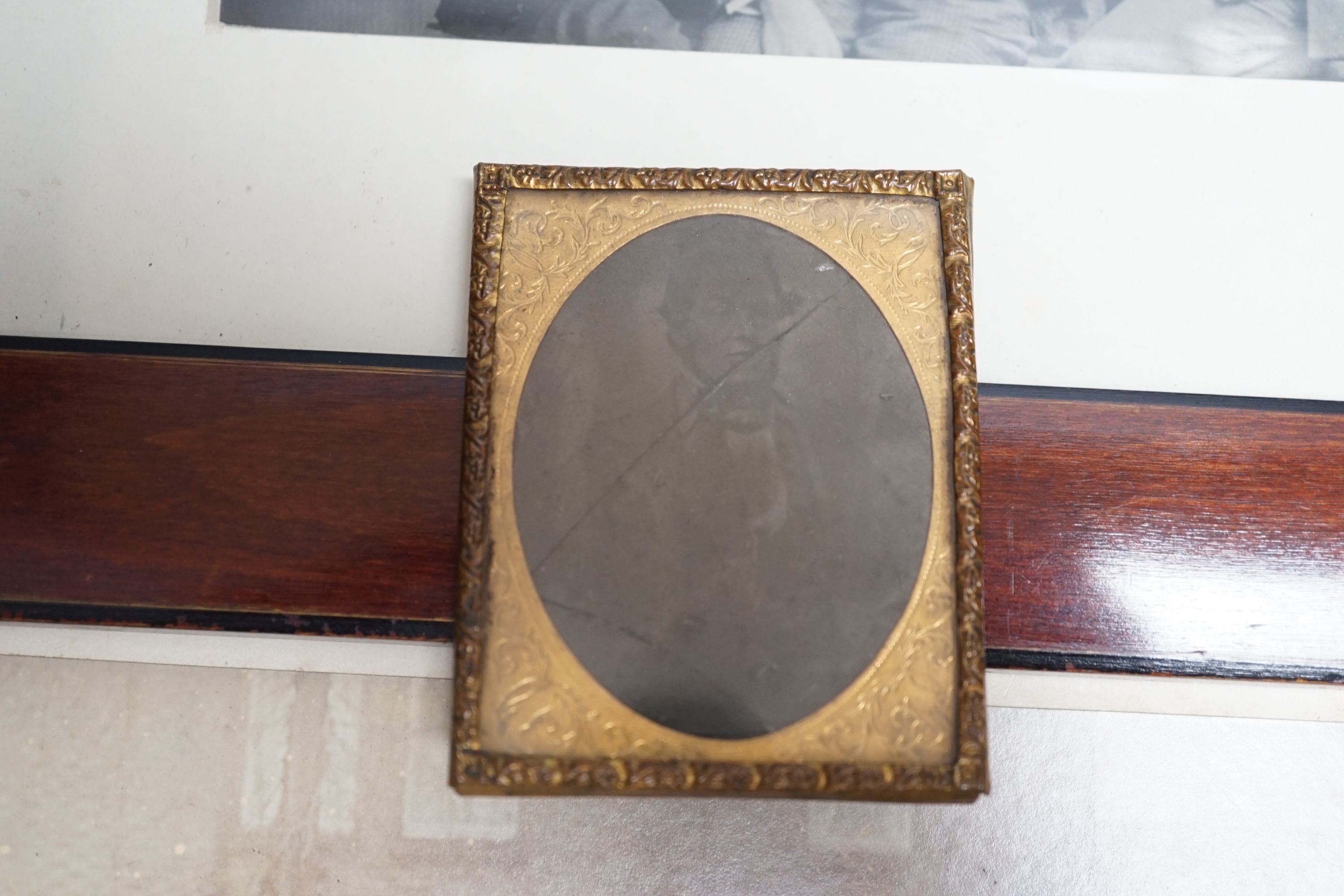 A collection of daguerrotypes, domestic photos